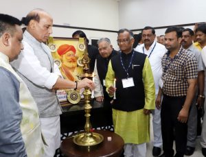 The Union Home Minister, Shri Rajnath Singh lighting the lamp to inaugurate the Confederation of All India Traders National Conclave, in New Delhi on July 23, 2018.