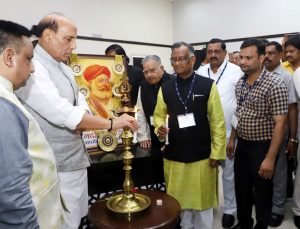 The Union Home Minister, Shri Rajnath Singh lighting the lamp to inaugurate the Confederation of All India Traders National Conclave, in New Delhi on July 23, 2018.