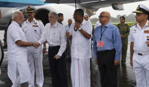 The Prime Minister, Shri Narendra Modi being received by the Governor of Kerala, Justice (Retd.) P. Sathasivam and the Chief Minister of Kerala, Shri Pinarayi Vijayan, on his arrival, in Kochi, to survey the flood affected areas, on August 18, 2018.