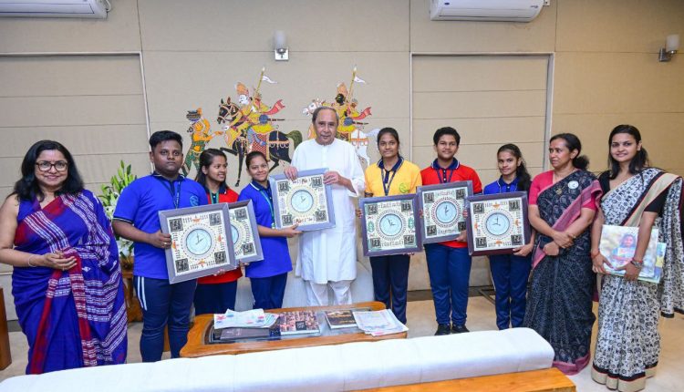 Students presented the Chief Minister with the Guinness Book of World Records plaque
